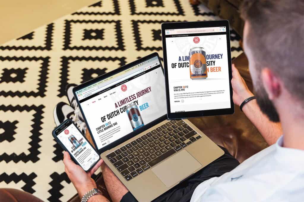 De website jopenbier.nl wordt getoond op verschillende schermen om te tonen hoe die responsive werkt.